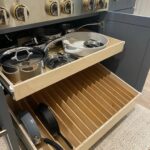 Sloped Pullout Shelf Baking Sheet Storage