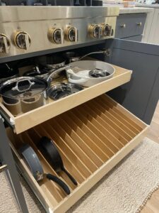 Sloped Pullout Shelf Baking Sheet Storage